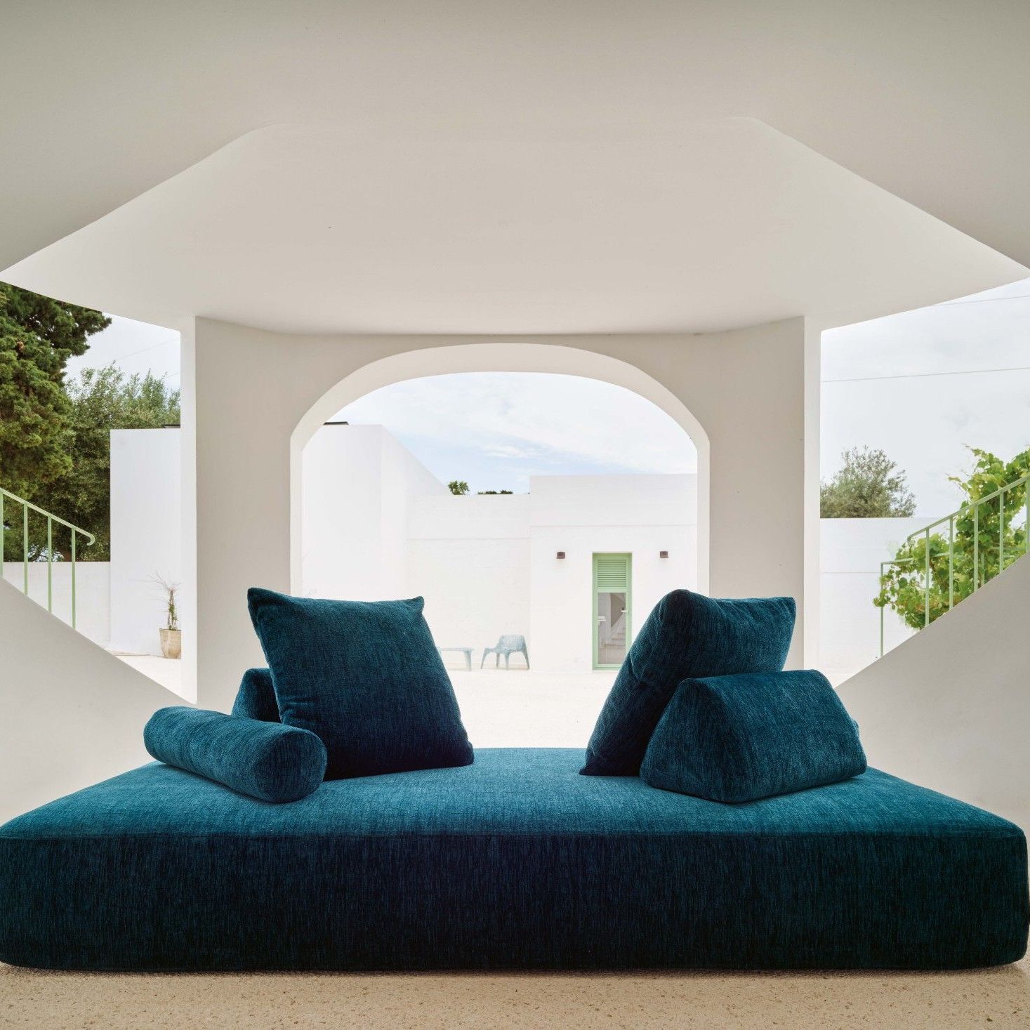  Sherazade outdoor in Every Place Cobalt offers a relaxing corner in the shade of the porch. 